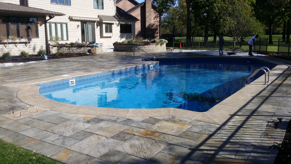 Outdoor Den, new pool in Brooklyn Park, brick pavers, stone,patio