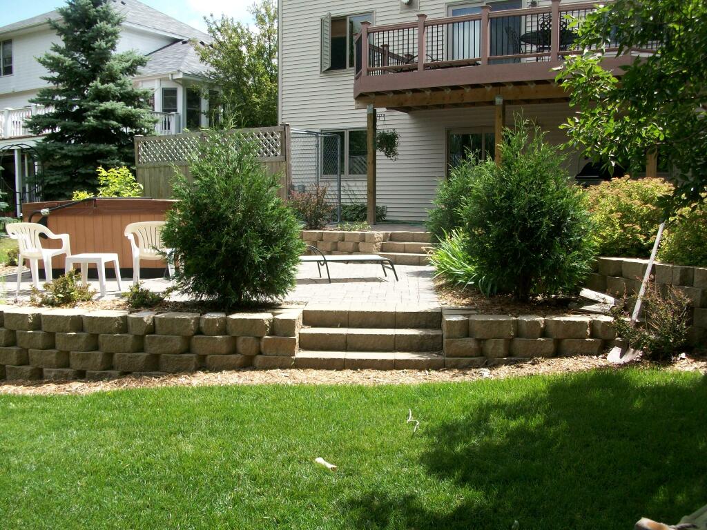 New Backyard, new retaining wall, new patio, pavers, plantings